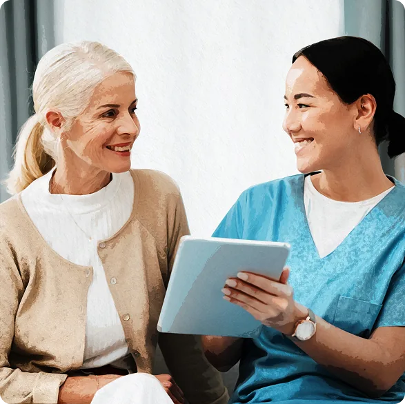 A patient and her Careway advocate looking at a tablet together